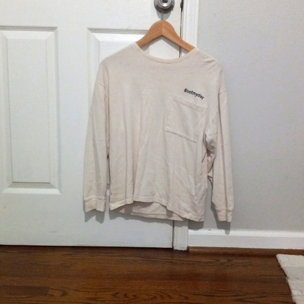 Cream long sleeved top